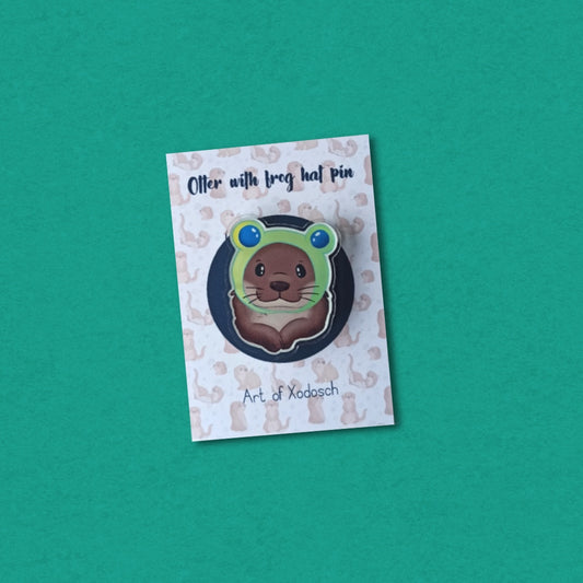 otter with frog hat acrylic pin